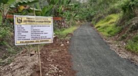 Warga Erpah girang, jalan peninggalan Belanda akhirnya diaspal setelah puluhan tahun.